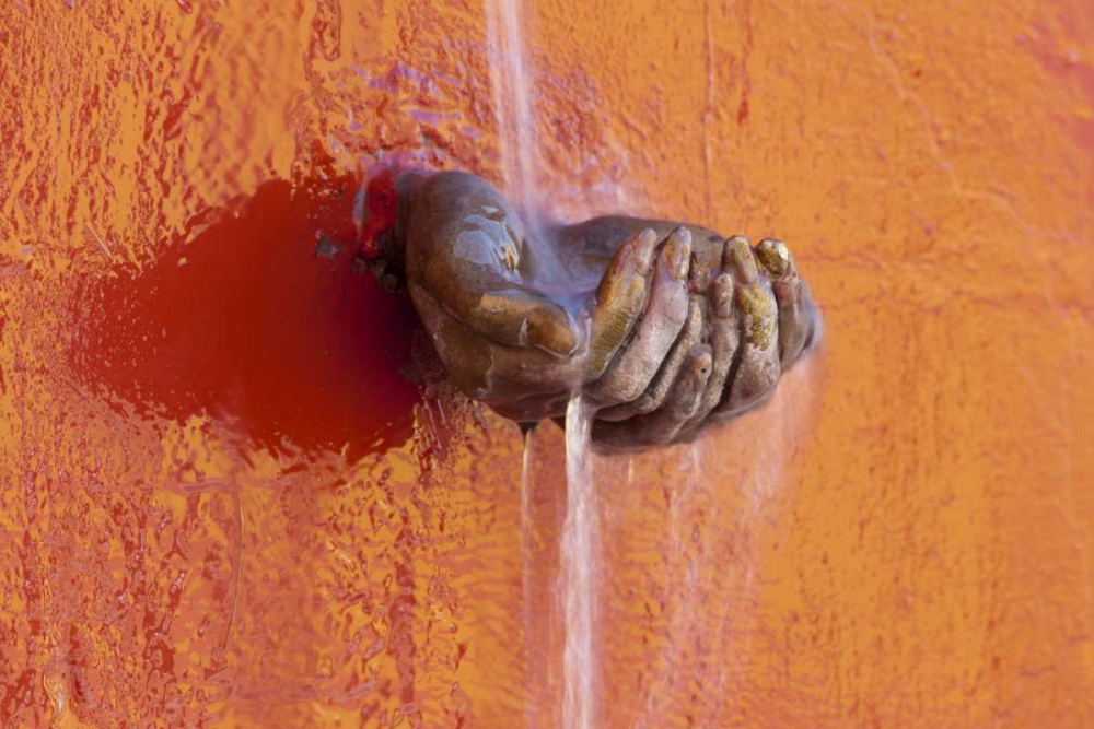 Mexico Fountain of water in cupped hands